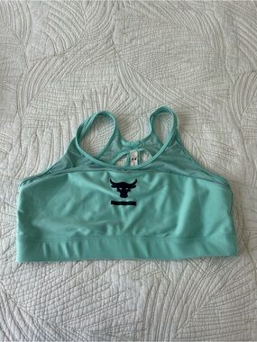 Under Armour mint green racerback sports bra with Project Rock logo